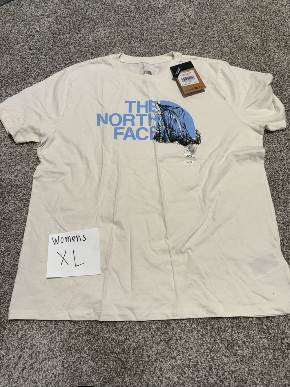 The North Face Women's Cream Short Sleeve Tee with Blue Logo